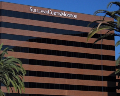 High Rise Building Sign Sullivan Curtis Monroe